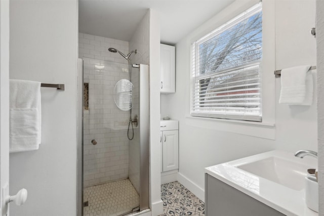 bathroom with vanity and walk in shower