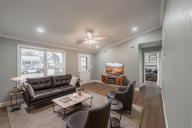 living room featuring crown molding, wood-type flooring, and ceiling fan