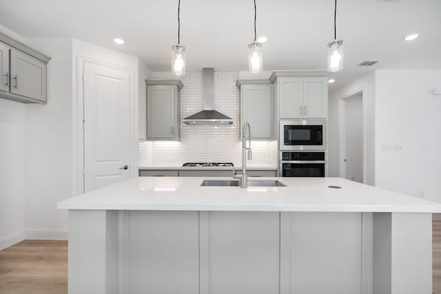 720 Rosemary Rd, Argyle, TX 76226 - kitchen featuring wall chimney range hood, a sink, gray cabinetry, built in microwave, and oven