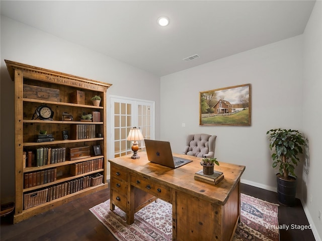 home office featuring dark hardwood / wood-style floors