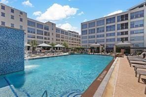 view of pool featuring pool water feature