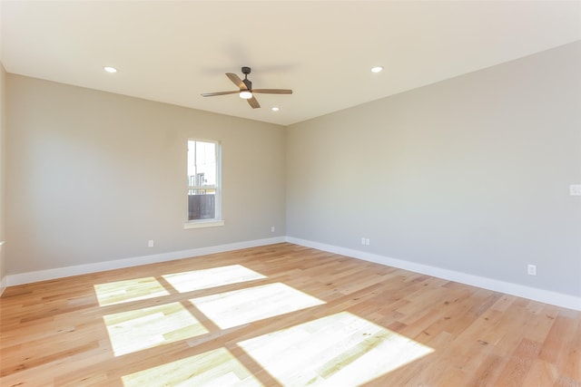 unfurnished room with light hardwood / wood-style flooring and ceiling fan