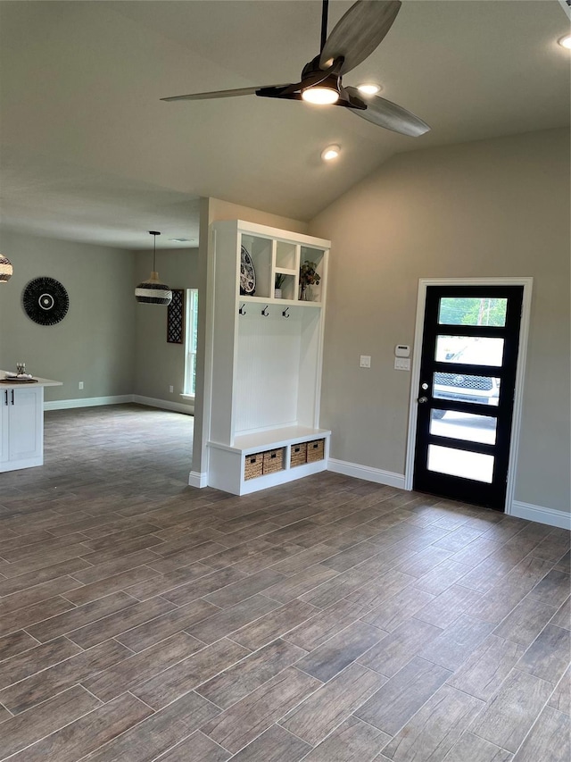 mudroom featuring lofted ceiling, dark wood-type flooring, and ceiling fan