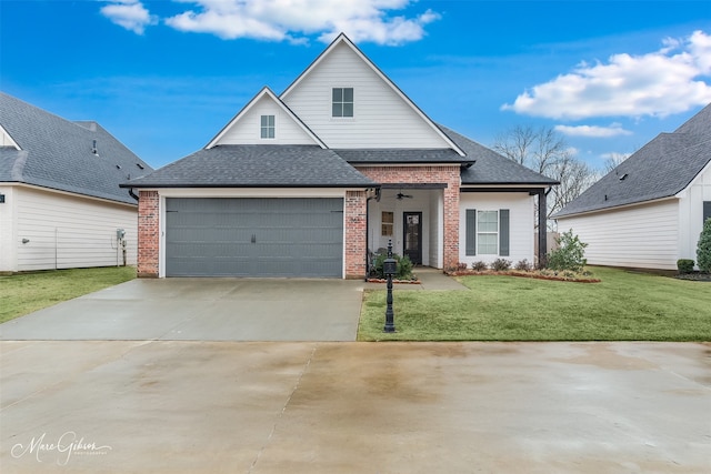 front facade featuring a garage and a front lawn