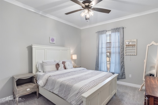 bedroom with crown molding, carpet floors, and ceiling fan