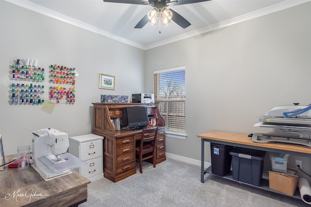 carpeted office with ornamental molding and ceiling fan