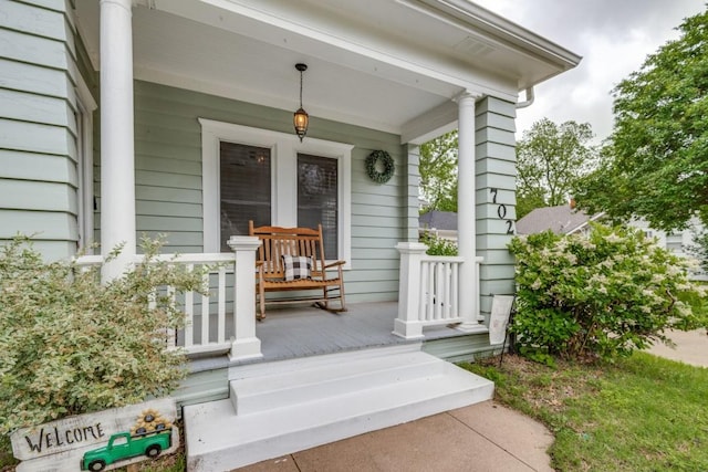 entrance to property with covered porch