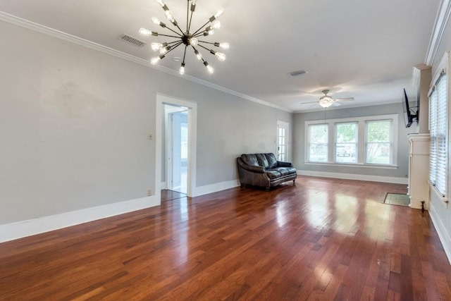 unfurnished room featuring ornamental molding, dark hardwood / wood-style floors, and ceiling fan with notable chandelier