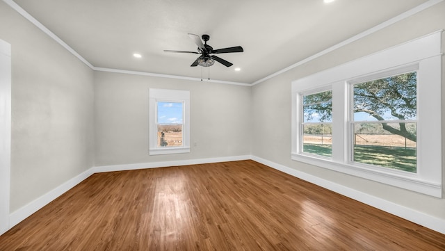 unfurnished room featuring crown molding, ceiling fan, and hardwood / wood-style floors