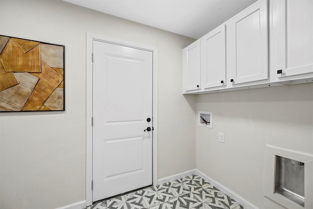 laundry area featuring cabinets and washer hookup