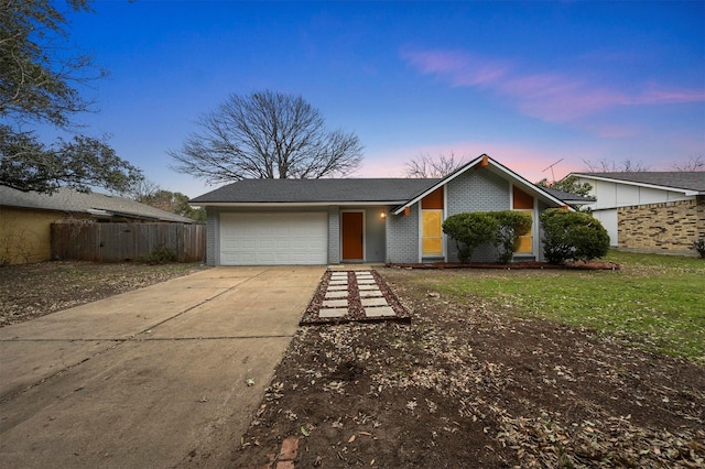 single story home featuring a garage