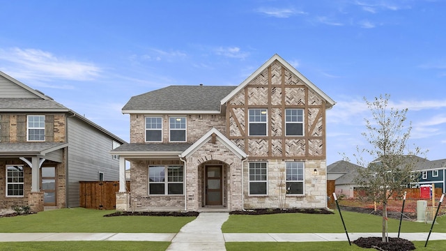 view of front of property with a front lawn