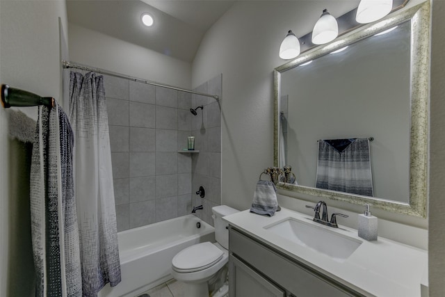 full bathroom featuring vanity, shower / tub combo with curtain, and toilet