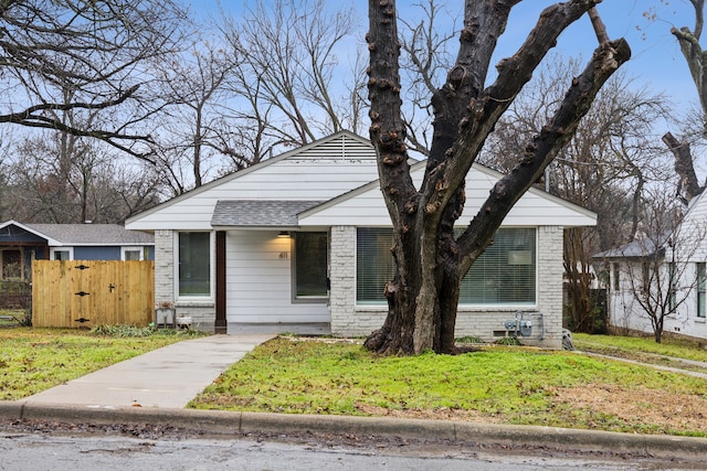 view of front of home with a front lawn