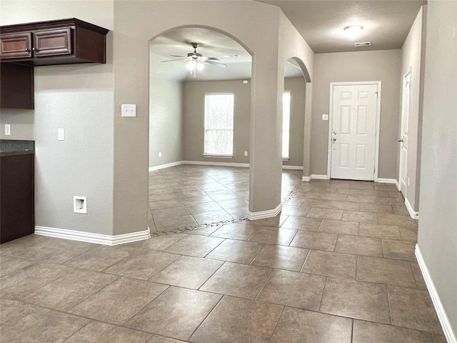 entryway with ceiling fan