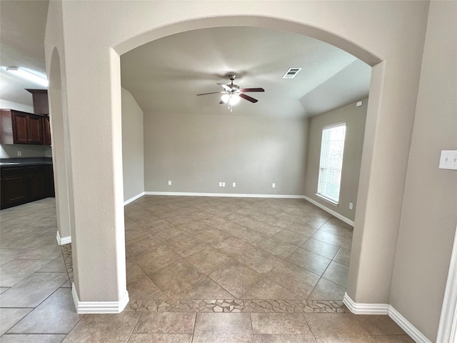 spare room with ceiling fan