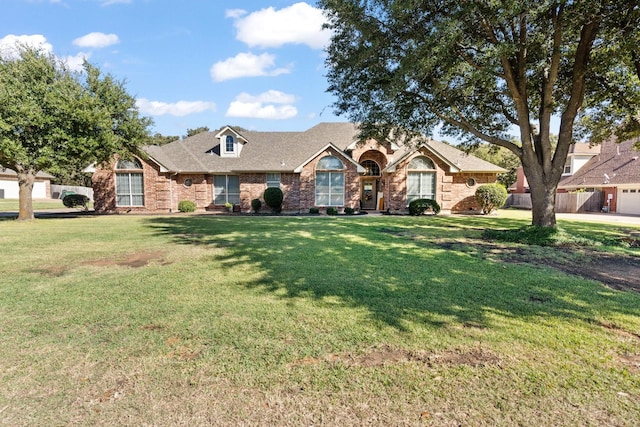 ranch-style house with a front yard