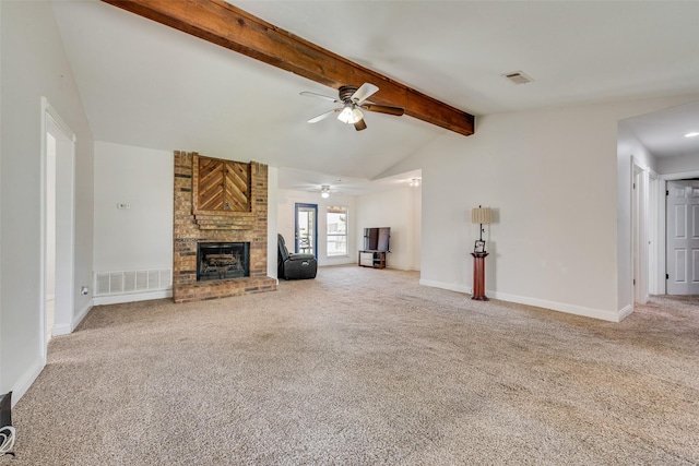 unfurnished living room with ceiling fan, carpet flooring, a brick fireplace, and vaulted ceiling with beams