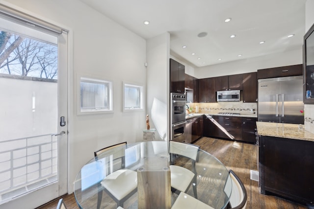 dining area featuring dark hardwood / wood-style floors