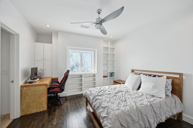 bedroom featuring ceiling fan and dark hardwood / wood-style flooring