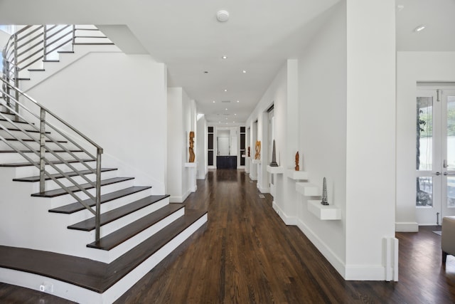 hallway featuring dark hardwood / wood-style floors