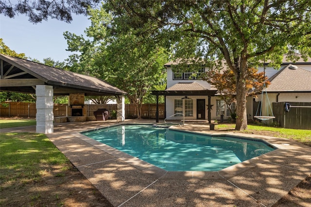 view of swimming pool featuring a gazebo, a patio, and a fenced backyard