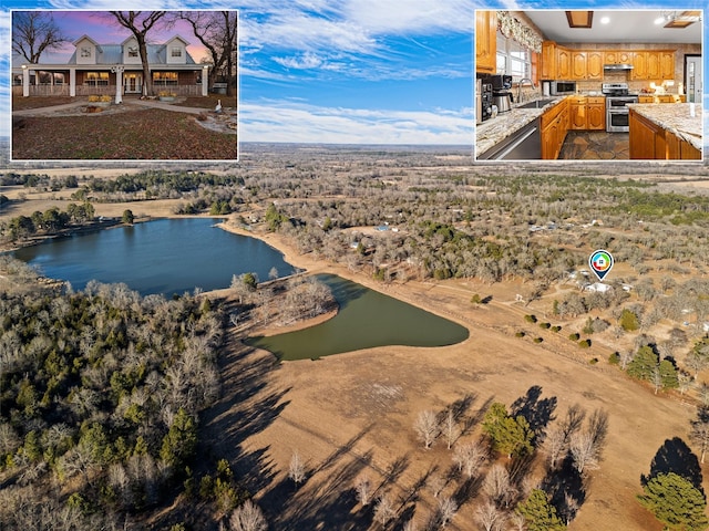 birds eye view of property with a water view