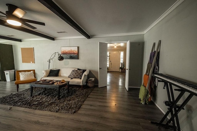 living room with dark hardwood / wood-style flooring, ornamental molding, ceiling fan, and beam ceiling