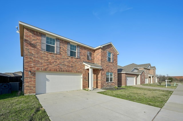 view of front of home with a garage and a front yard