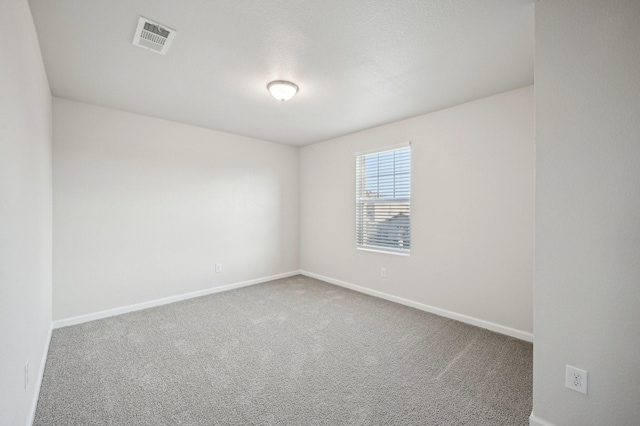 unfurnished room with carpet