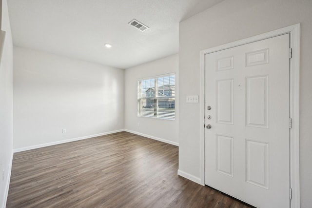 foyer with dark wood-type flooring