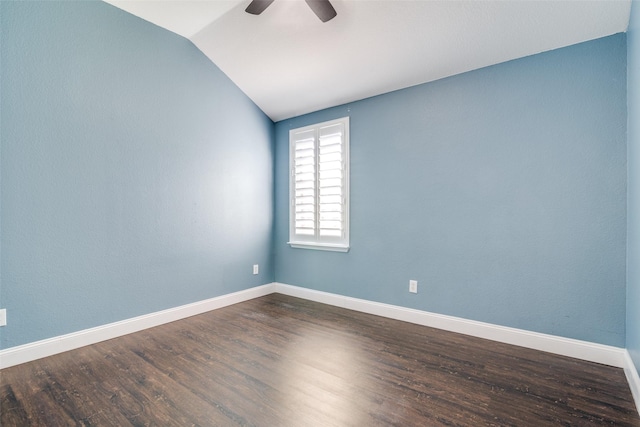 spare room featuring ceiling fan, wood-type flooring, and vaulted ceiling