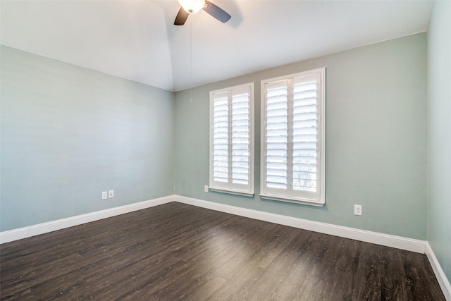 unfurnished room with ceiling fan, lofted ceiling, and wood-type flooring