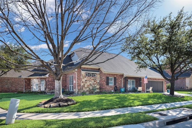 view of front facade featuring a garage and a front lawn