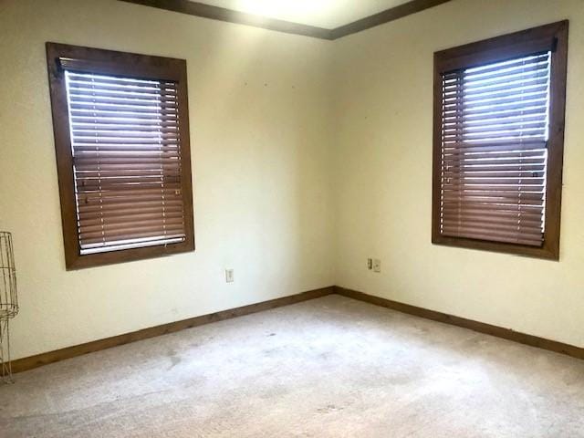 empty room featuring carpet floors