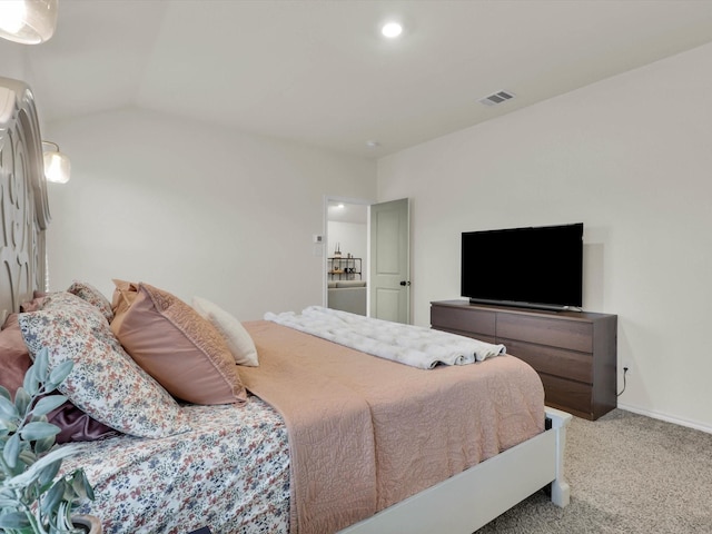 carpeted bedroom featuring lofted ceiling