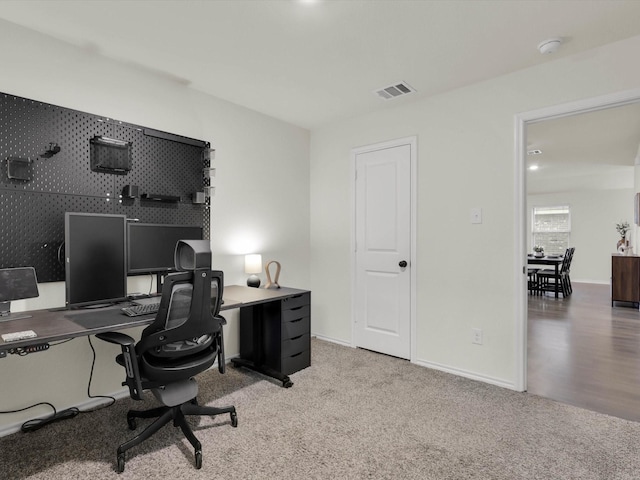 office space featuring light colored carpet