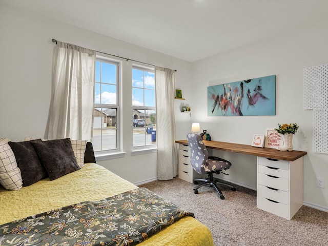 bedroom featuring light colored carpet