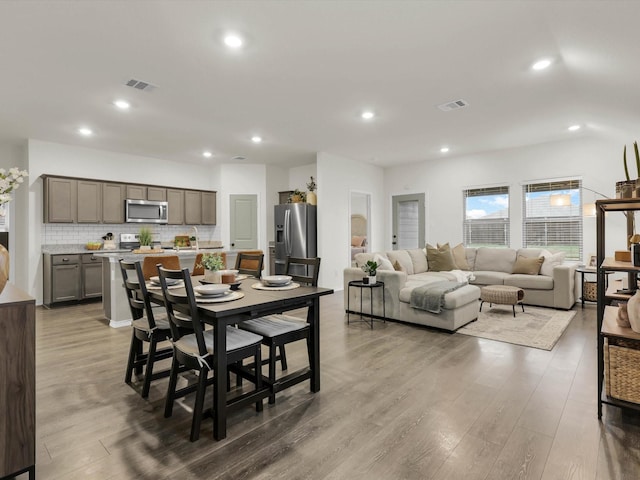 dining room with light hardwood / wood-style flooring