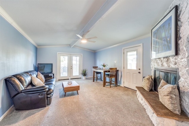 carpeted living room with french doors, ornamental molding, a fireplace, and vaulted ceiling with beams