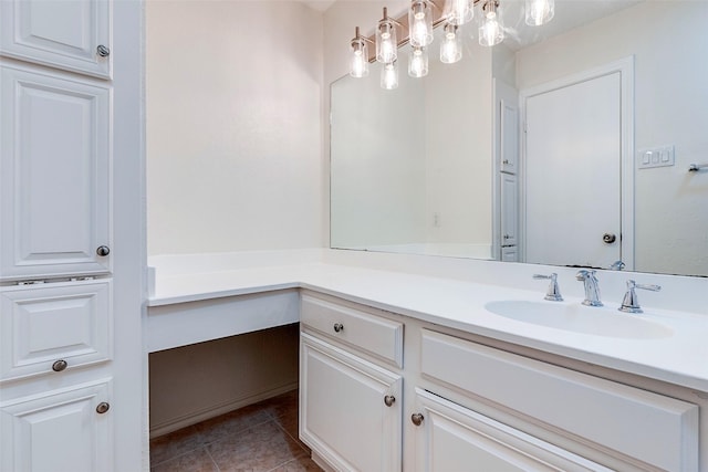 bathroom featuring tile patterned flooring and vanity