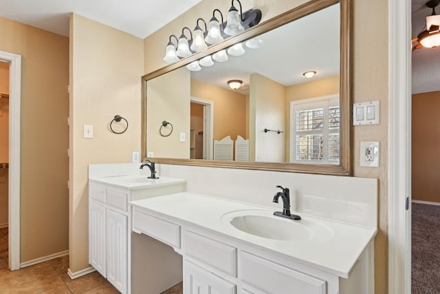 bathroom featuring vanity and tile patterned flooring