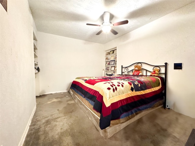 bedroom with ceiling fan and a textured ceiling