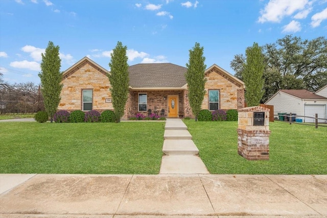 view of front of home with a front yard