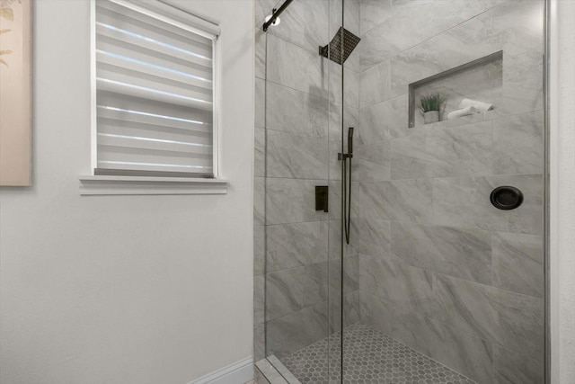 bathroom featuring an enclosed shower