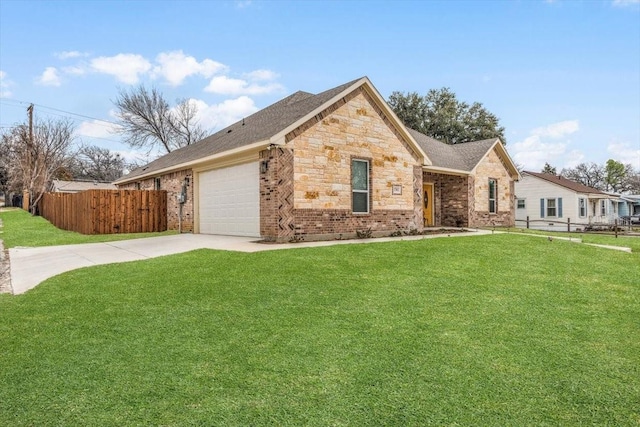 view of front of property with a garage and a front yard