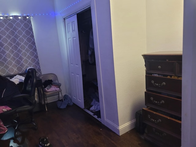 home office featuring dark wood-style floors and baseboards