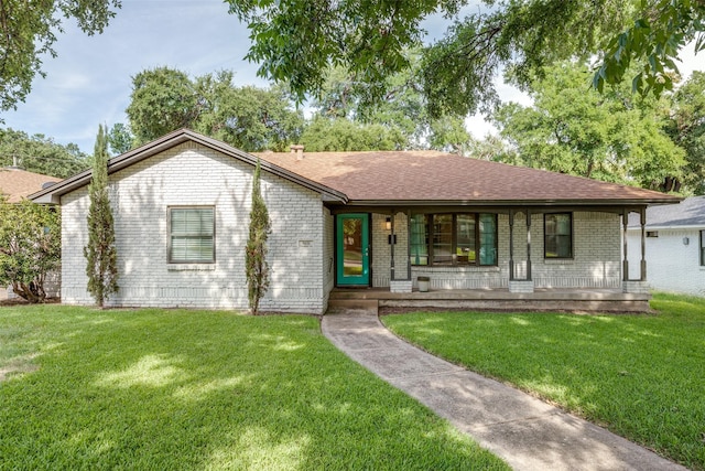 ranch-style home with a front yard