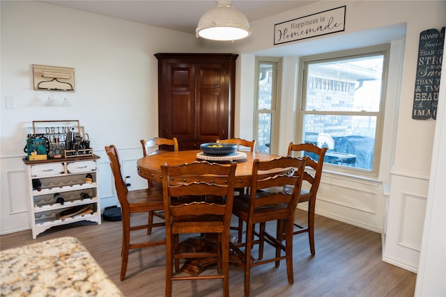 dining room with dark hardwood / wood-style floors