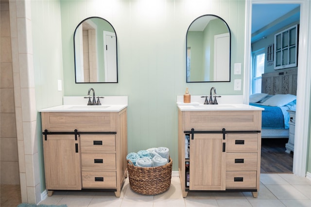 bathroom featuring vanity and tile patterned flooring